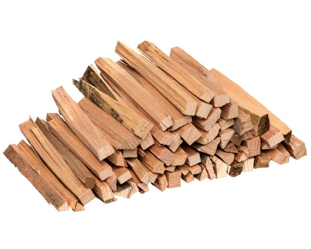 Kindling 5kg Bag Dry Pine Kindling, a pile of dry pine wood pieces ready for firewood use.